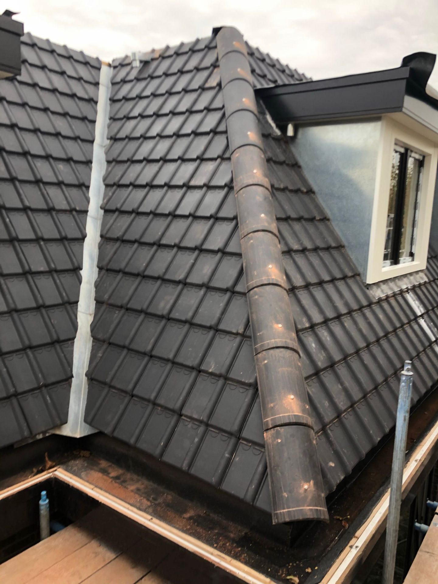 Nokvorst en dakpannen detail